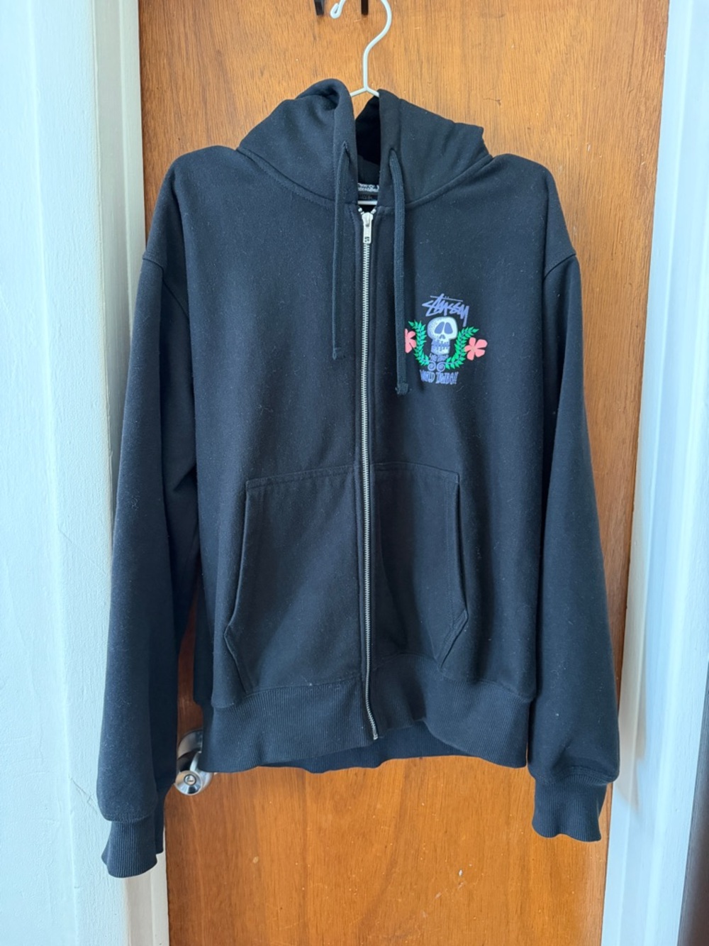 Stussy Black Full-Zip Hoodie with Colorful Skull Chest Graphic
